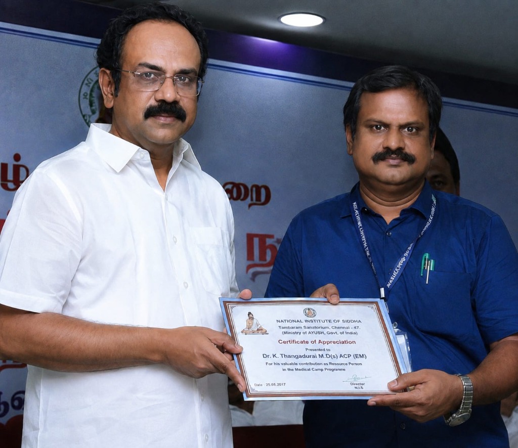 Dr. K. Thangadurai receiving Certificate of Appreciation from National Institute of Siddha